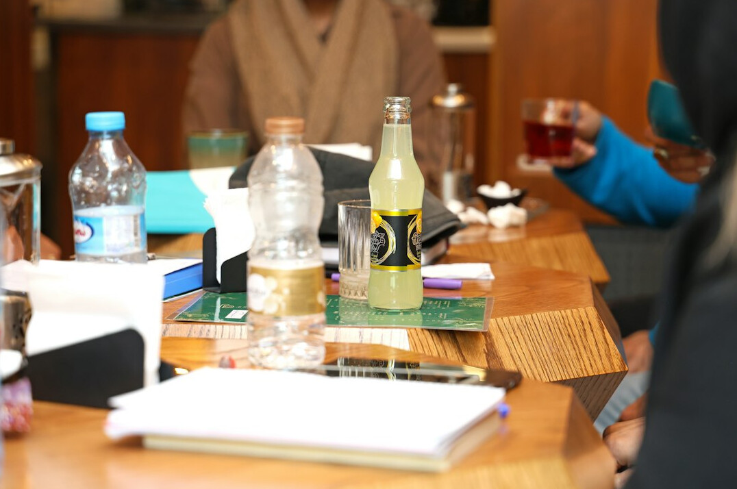 group of people discussing at table
