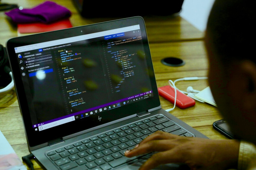 student showing coding project