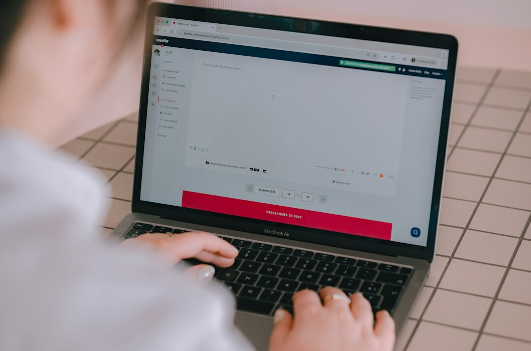 kids coding on laptops